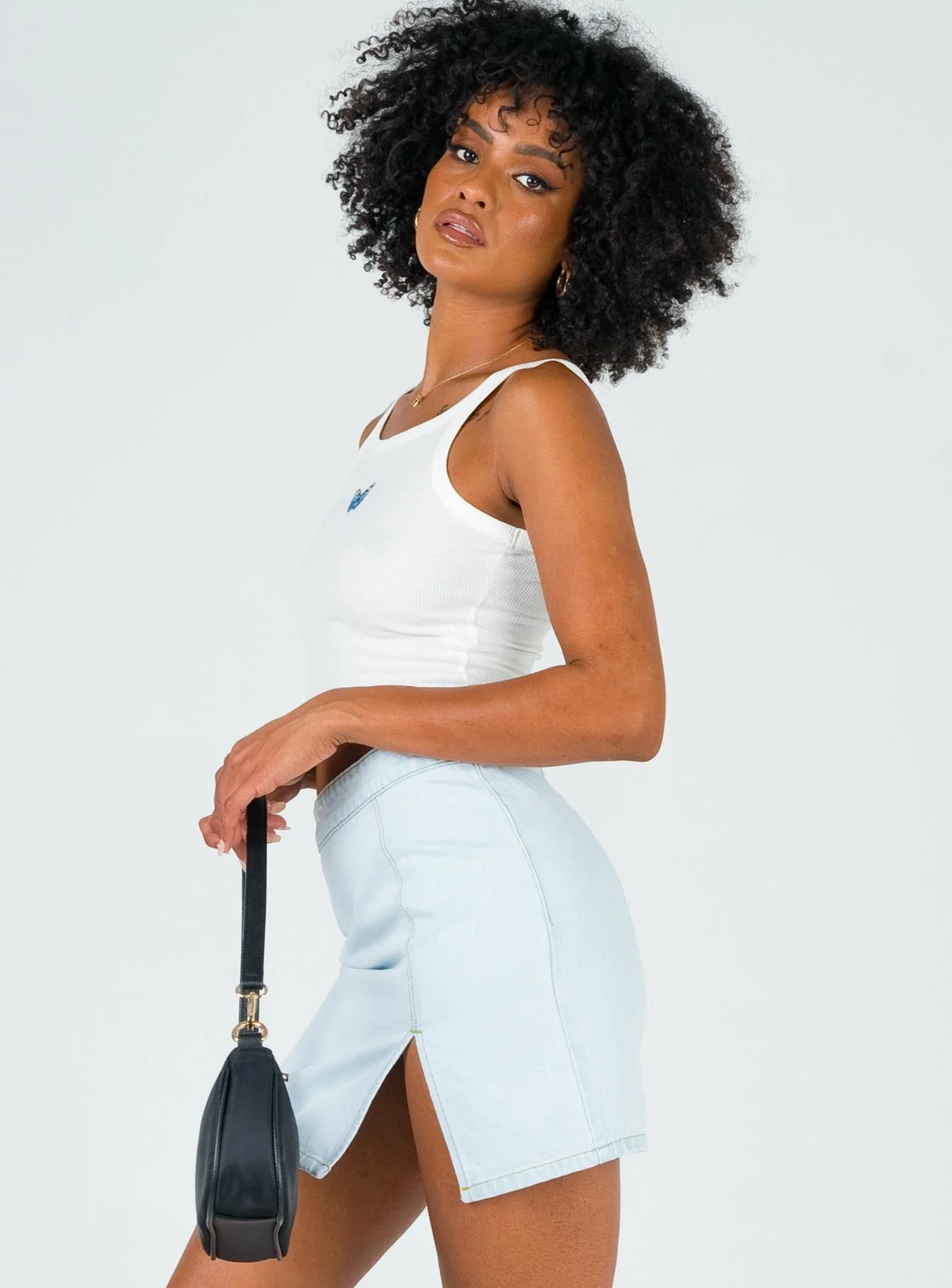The Lola Mini Skirt Light Wash Denim - Image 3