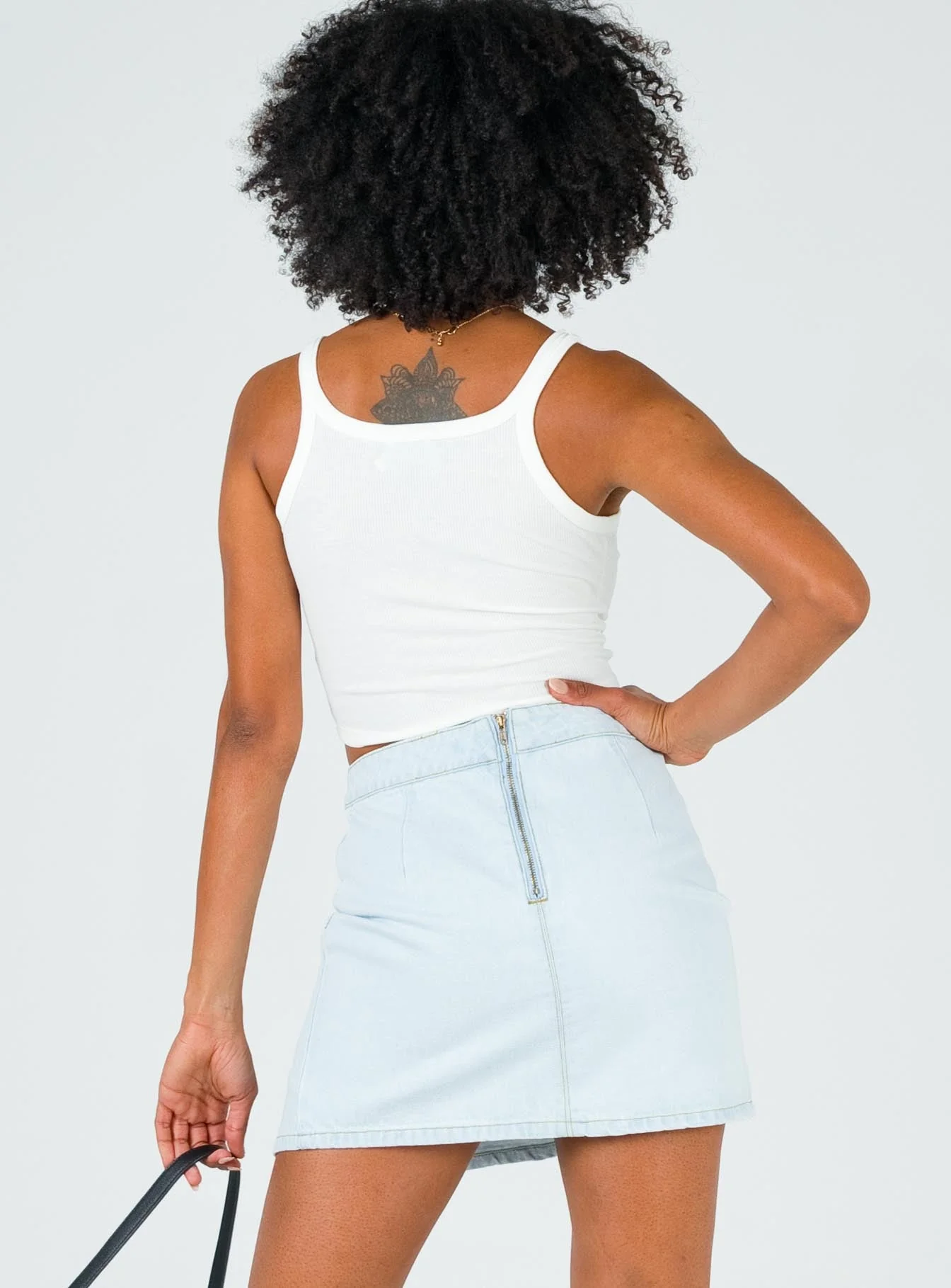 The Lola Mini Skirt Light Wash Denim - Image 4